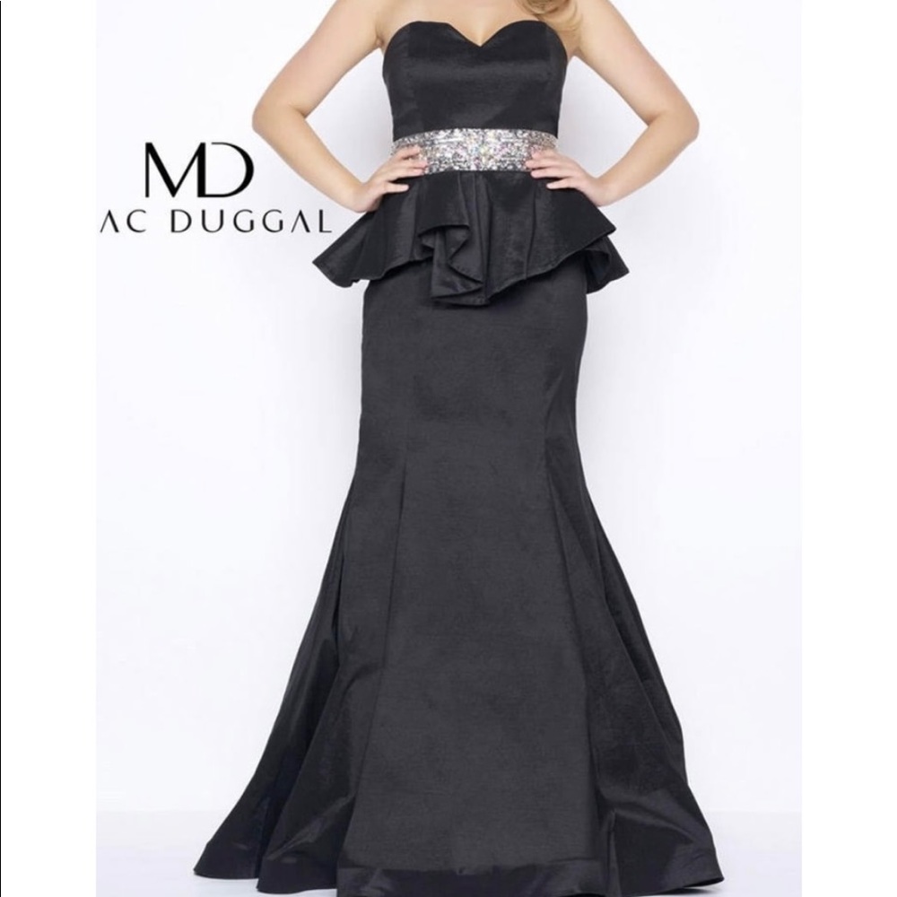 Strapless, peplum, beaded waistline evening gown